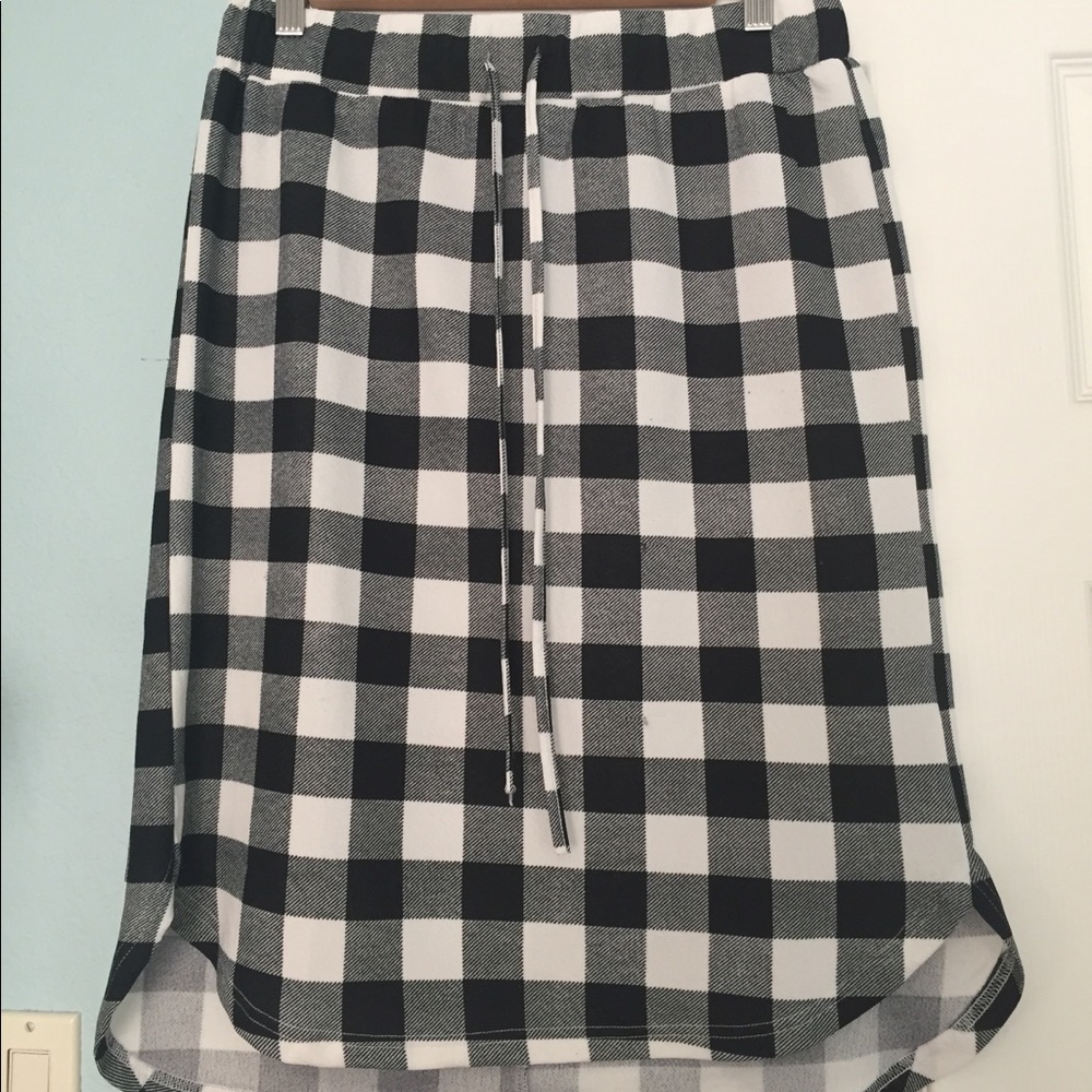Tickled Teal curved hi-low hem drawstring skirt.